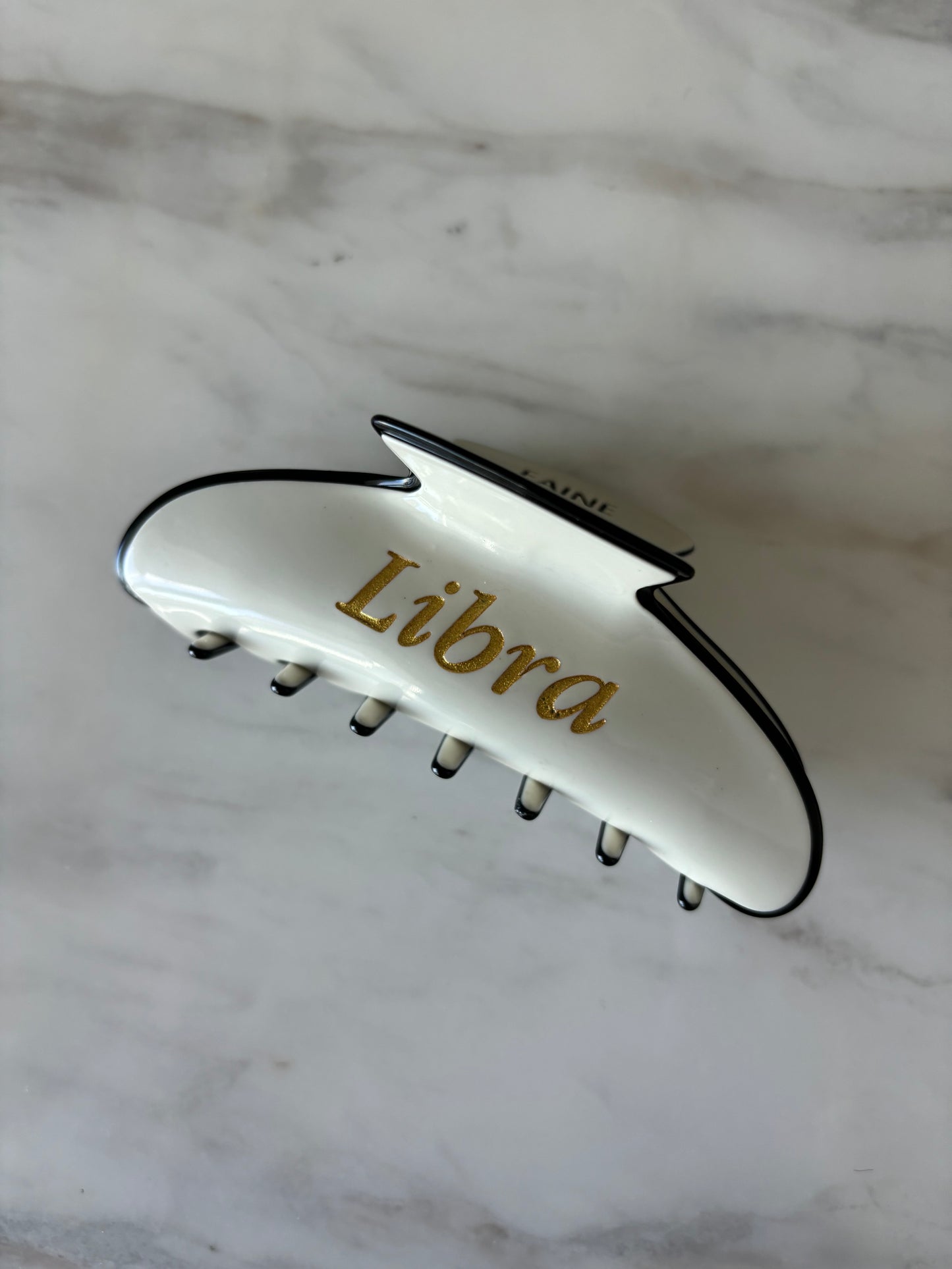 Libra Claw